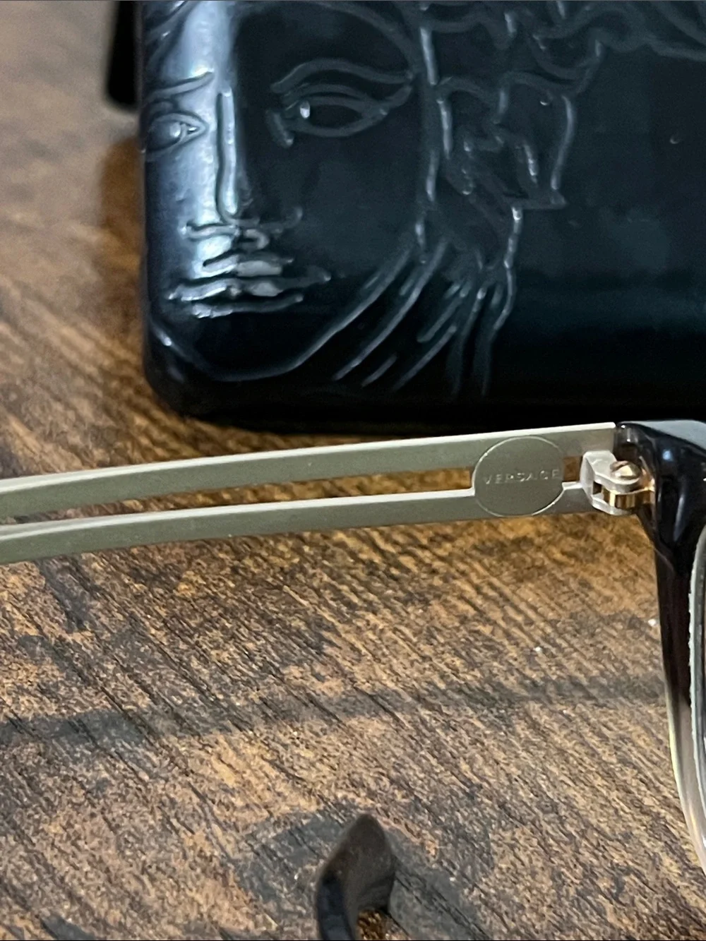 Versace Black Frame Sunglasses with Gold Temples